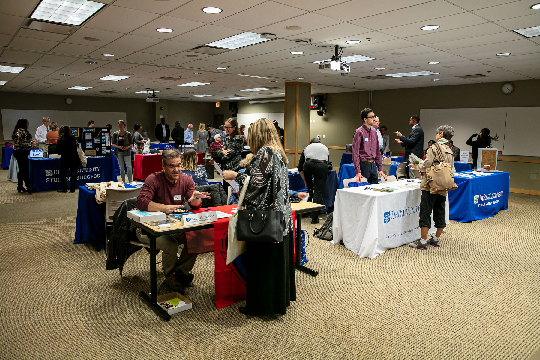 More than 20 departments set up educational booths in the Student Center, and attendees were able to engage with department representatives about campus resources for adjunct faculty. (DePaul University/Randall Spriggs)